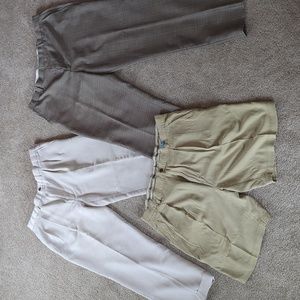 Bundle of men's golf pants and pair of shorts